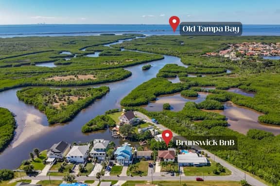 Canal Front, Kayak, Paddle Board, Hot Tub, Convenient Location